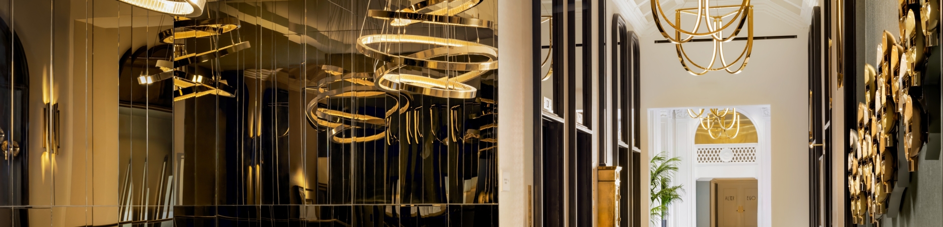 A lobby hallway at the Fairmont Breakers with lighting